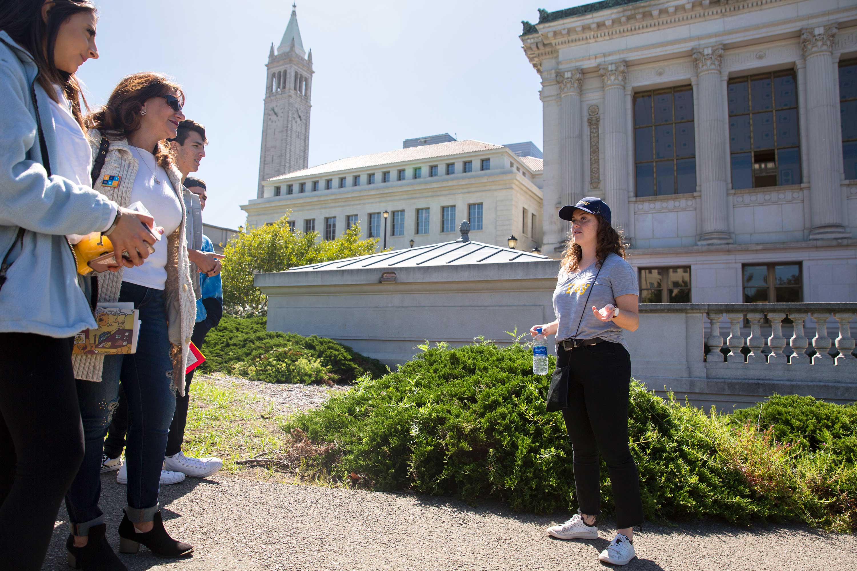 A tour guide giving a tour on the UC Berkeley campus.