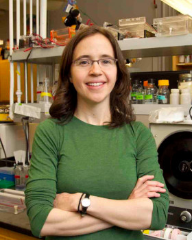 Rachel Adams in front of lab bench Rachel Adams in front of lab bench