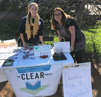 CLEAR graduate students at a booth at the Oakland Temescal Farmers’ Market, offering to speak with the community about science and food security.  
